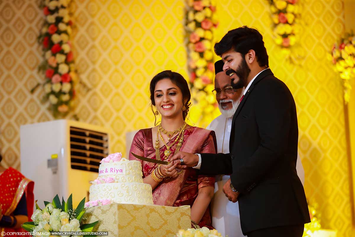 Christian Wedding cake Cutting Photos Chalakudy