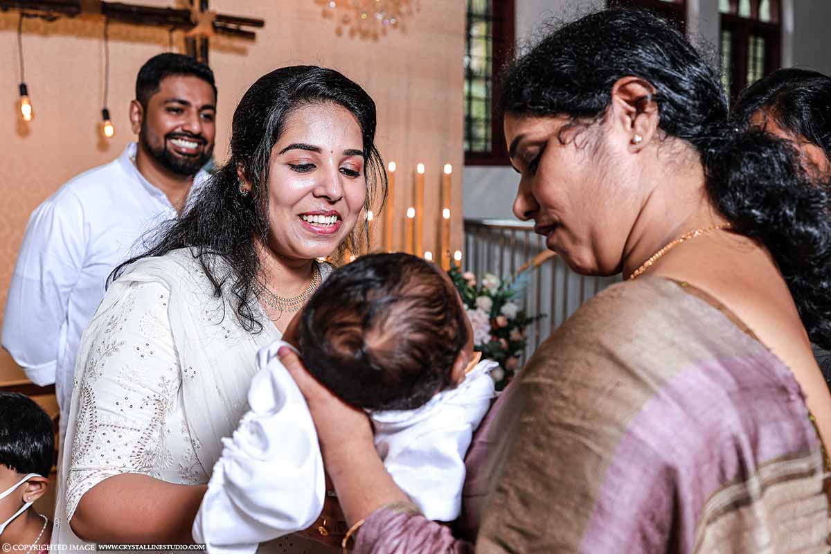 Candid Family Photos In Christening Ceremony At Pala